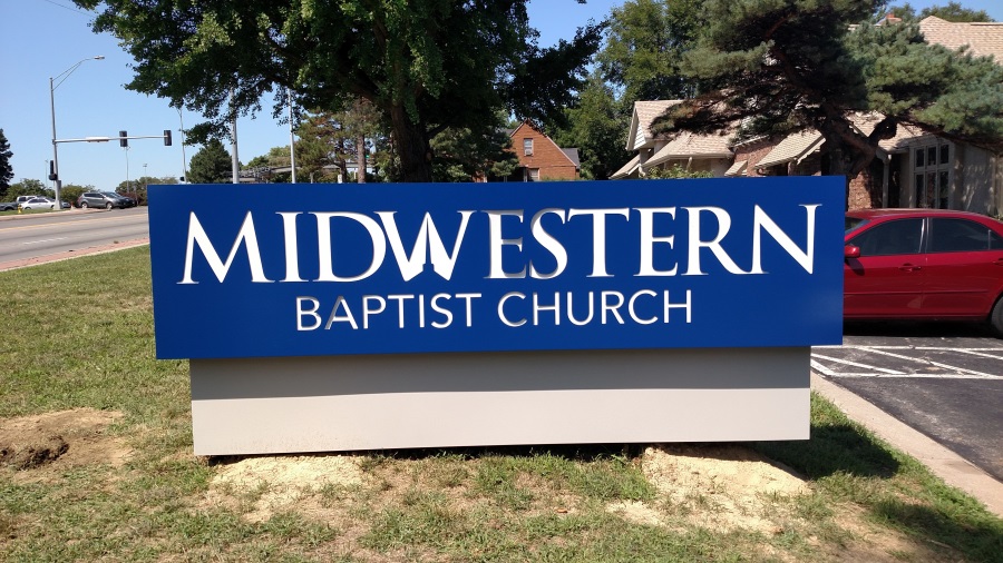 Illuminated, double-face Midwestern Baptist Church monument sign